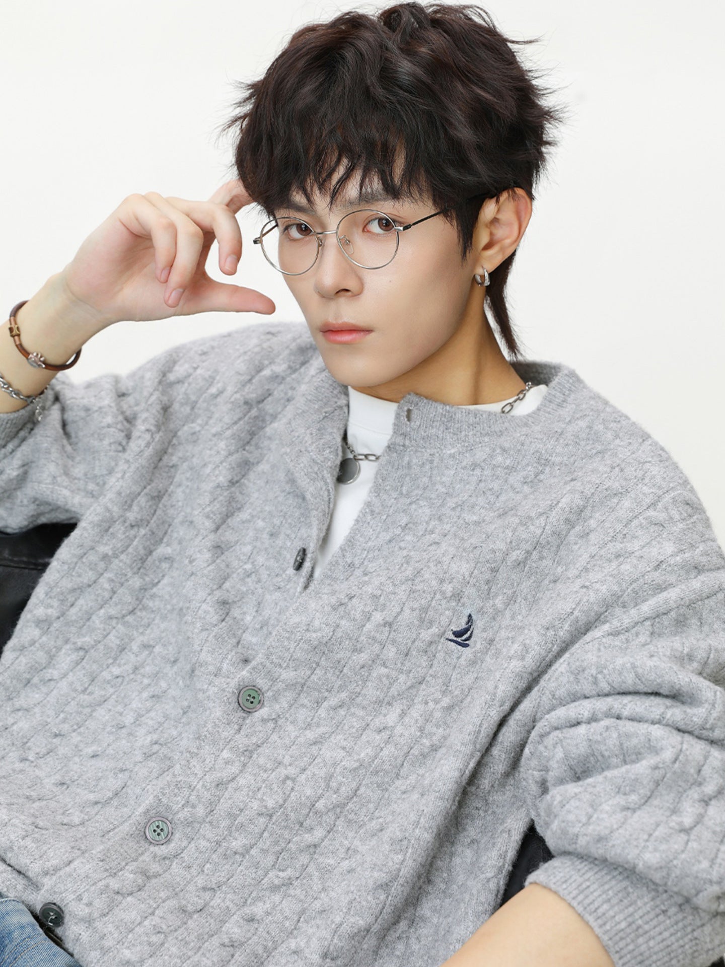 ツイストケーブルボタンカーディガン